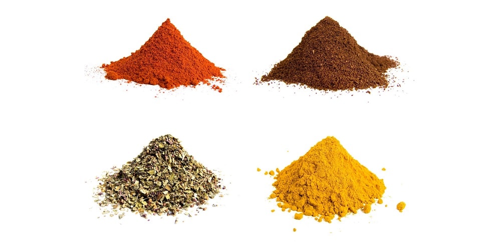 Four piles of spices