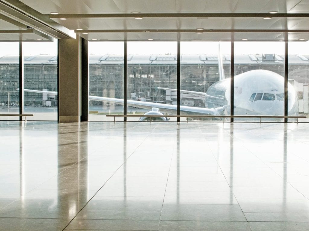 Airplane seen through window in airport terminal