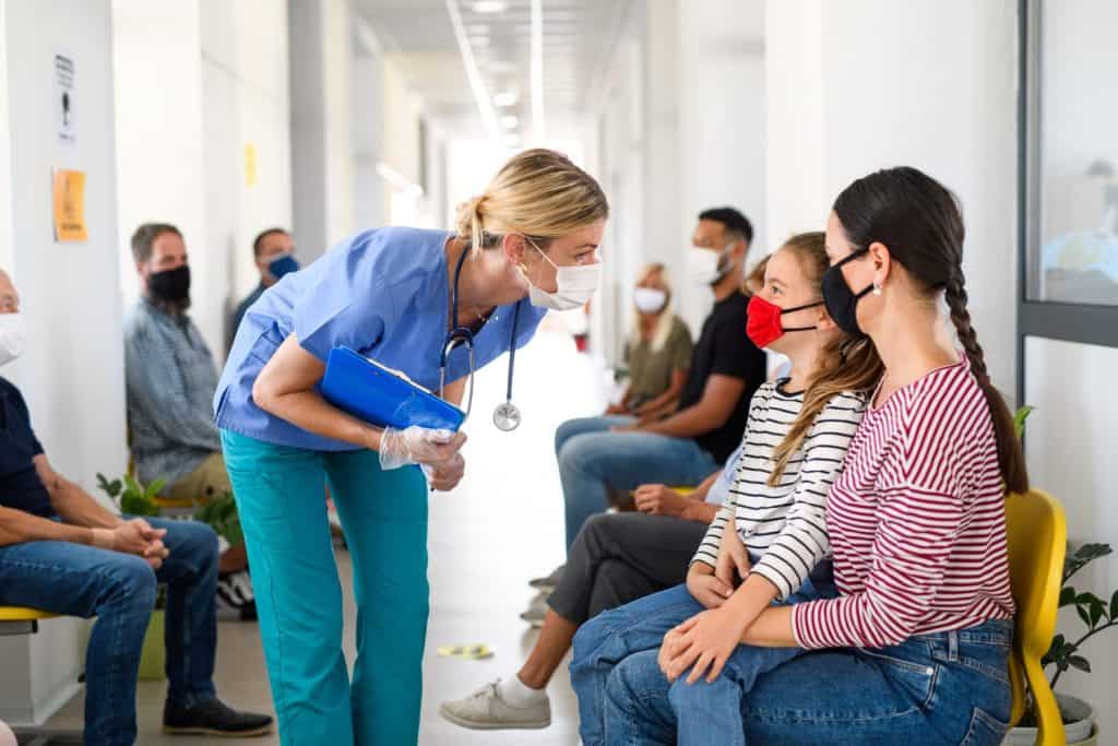 Portrait of nurse and patients with face masks, coronavirus, covid-19 and vaccination concept.